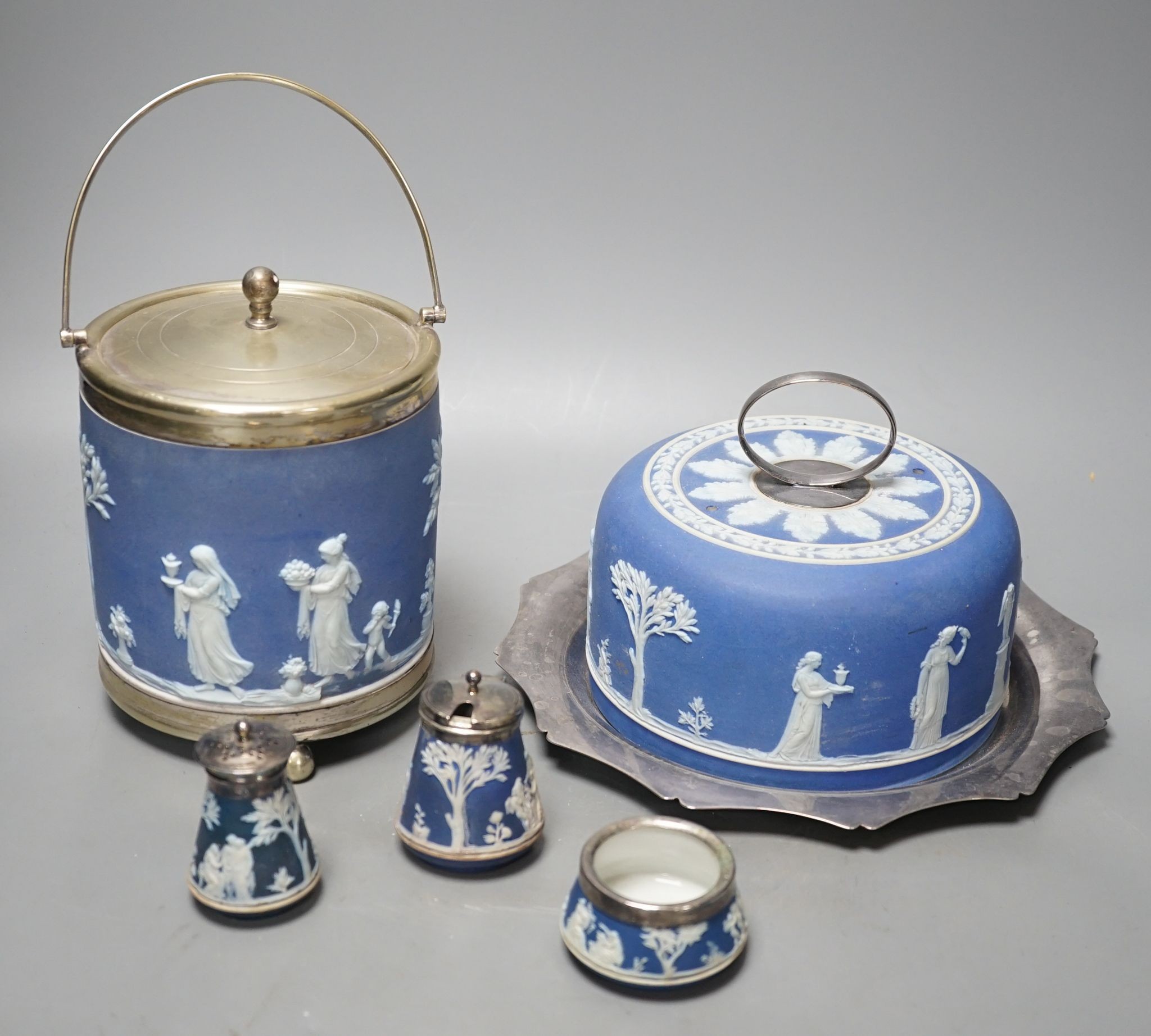 A Victorian Wedgwood blue jasper biscuit barrel and a blue jasper cheese dish cover, with a plated stand , 3 piece condiment set
